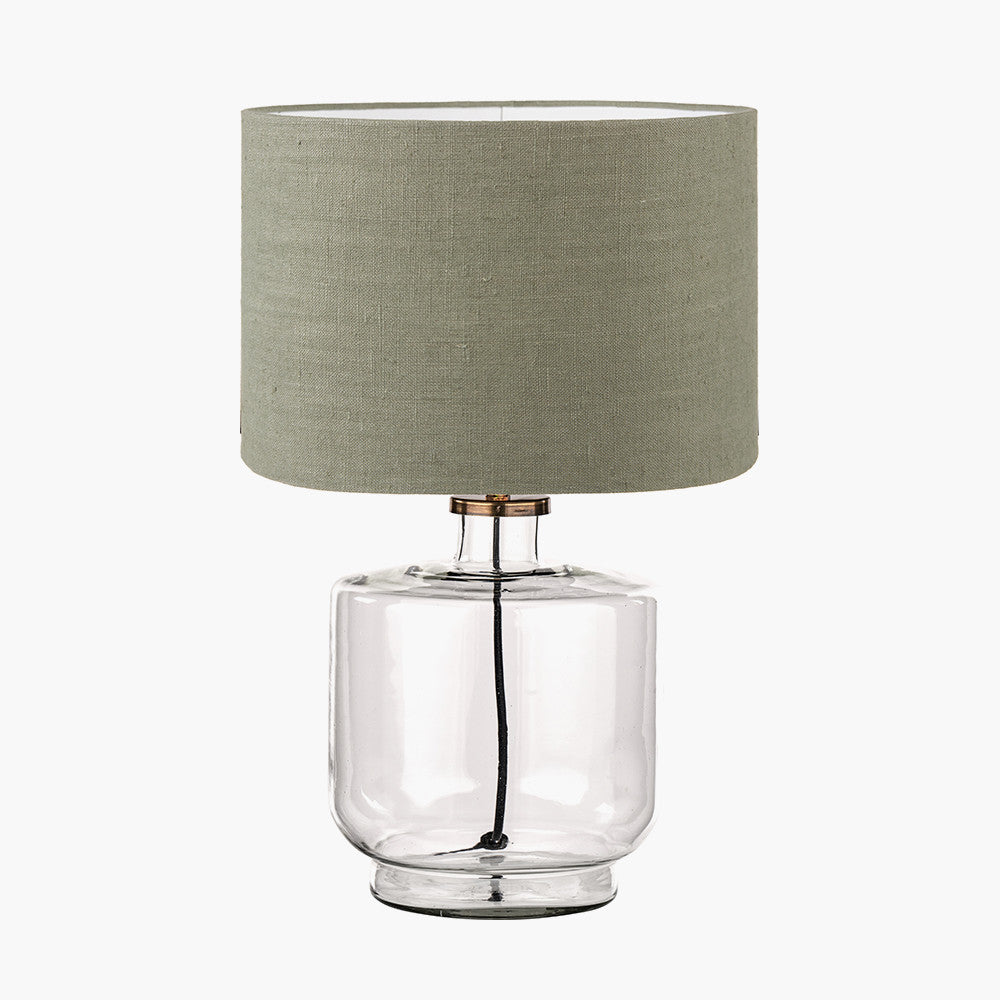 Josie Clear Glass and Antique Brass Metal Table Lamp Base with Edward 30cm Pistachio Green Linen Cylinder Lampshade