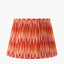 Corby Clear Glass Table Lamp Base with Suri 40 cm Pink and Orange Ikat Patterned Mushroom Pleat Tapered Lampshade