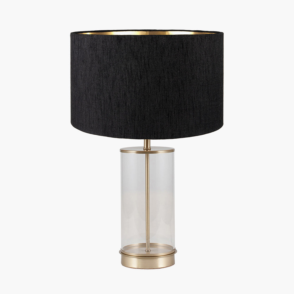 Westwood Clear Glass and Champagne Metal Table Lamp Base with Stellan 35cm Black Slubbed Silk Mix Gold Lined Cylinder Lampshade