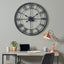 Black Metal Round Skeleton Wall Clock