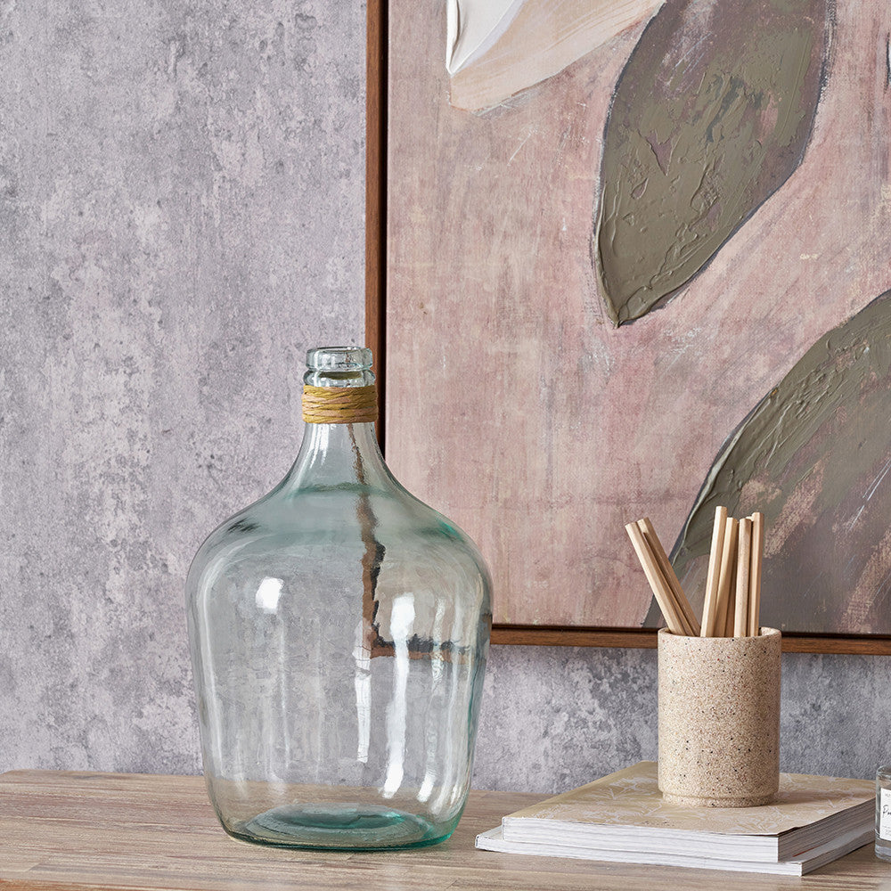 Clear Recycled Small Bottle Vase With A Raffia Wrapped Neck
