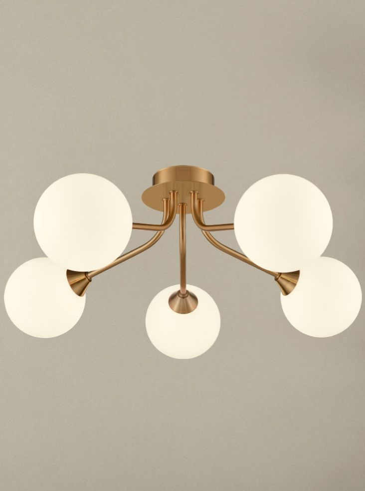 Cosmic 5 light fitting in antique gold with matt opal glass
