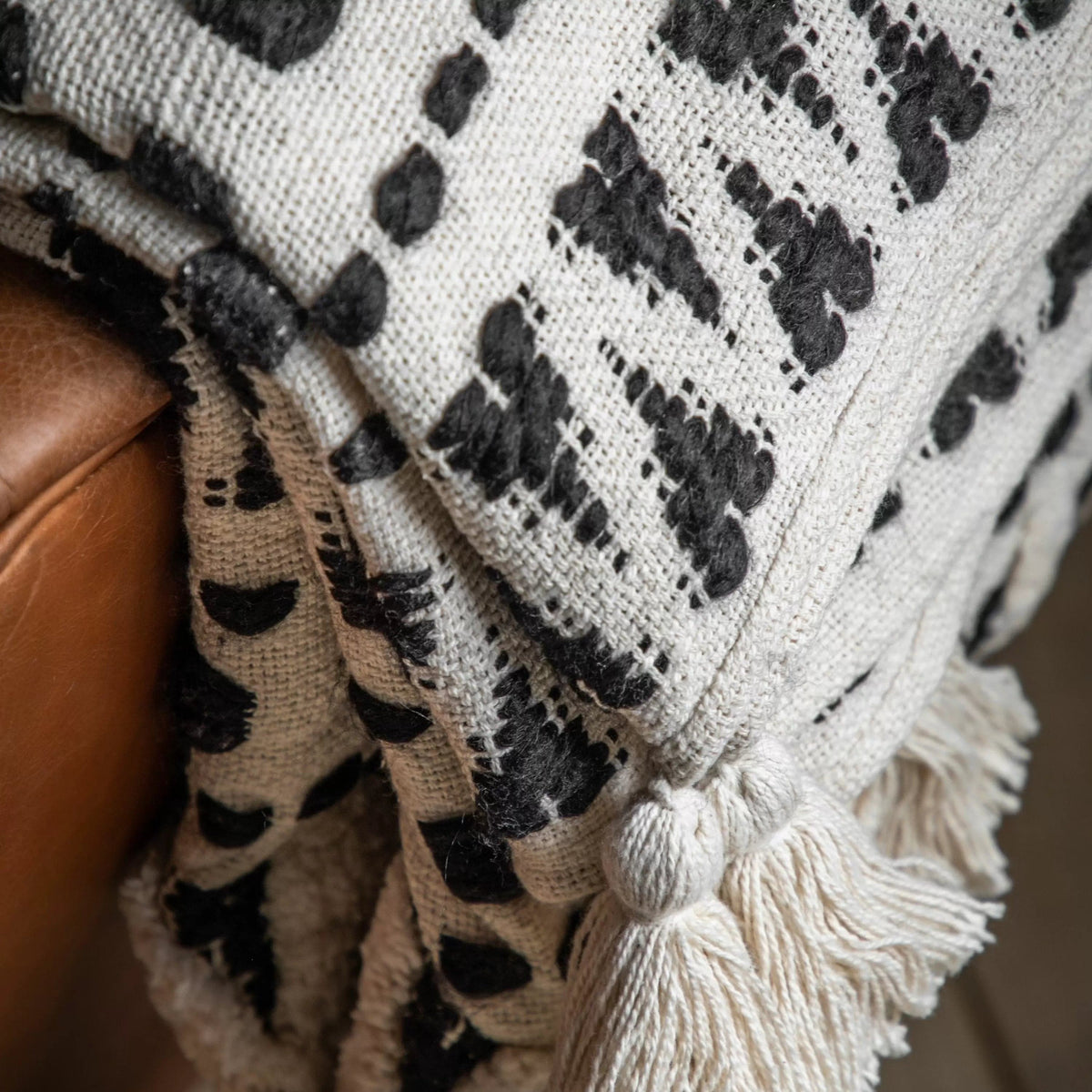 Barton-le-Clay & Cream Tufted Throw.
