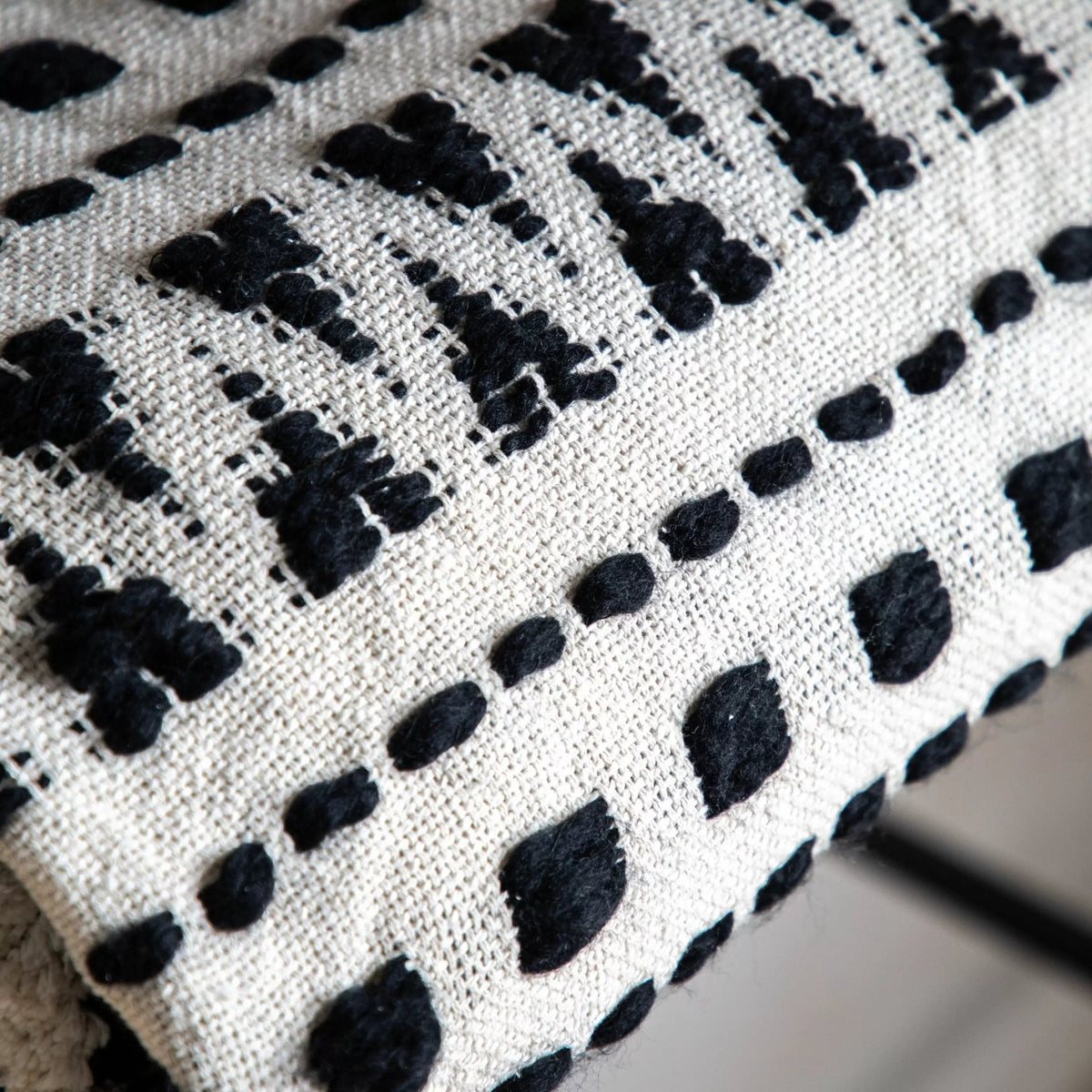 Barton-le-Clay & Cream Tufted Throw.