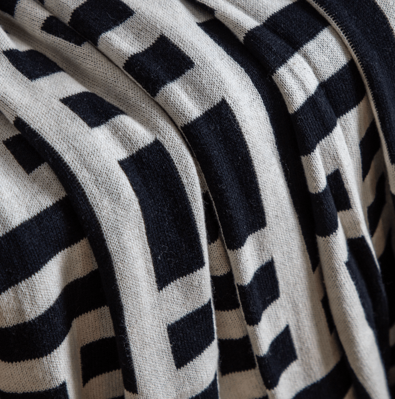 Devoran Knitted Tassel Throw Black.