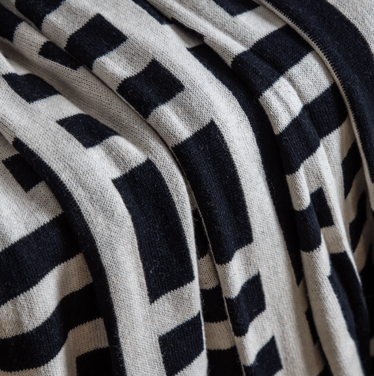 Devoran Knitted Tassel Throw Black.