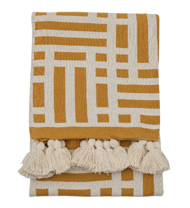 Devoran Knitted Tassel Throw Ochre.