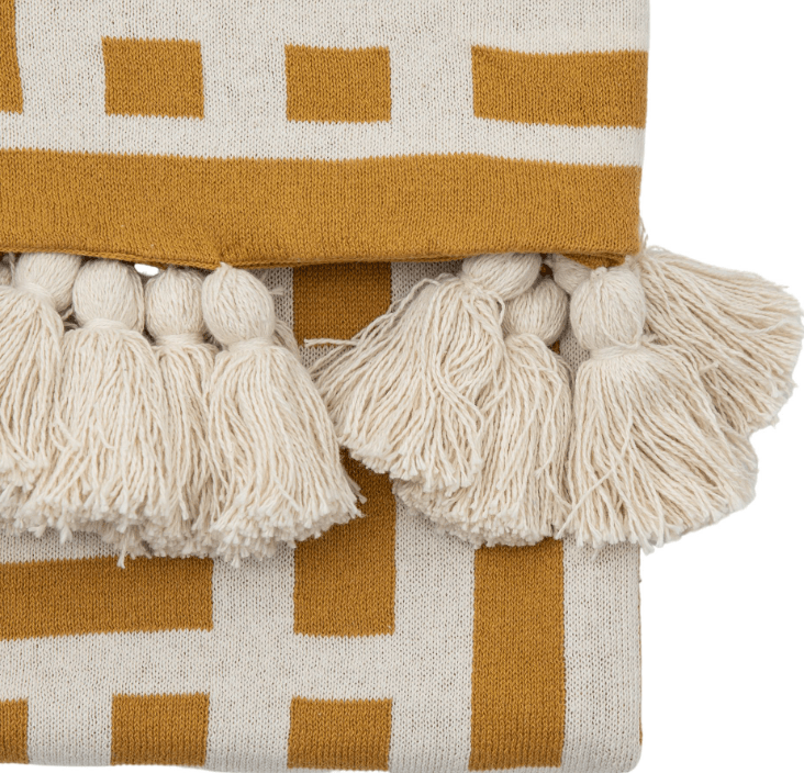 Devoran Knitted Tassel Throw Ochre.
