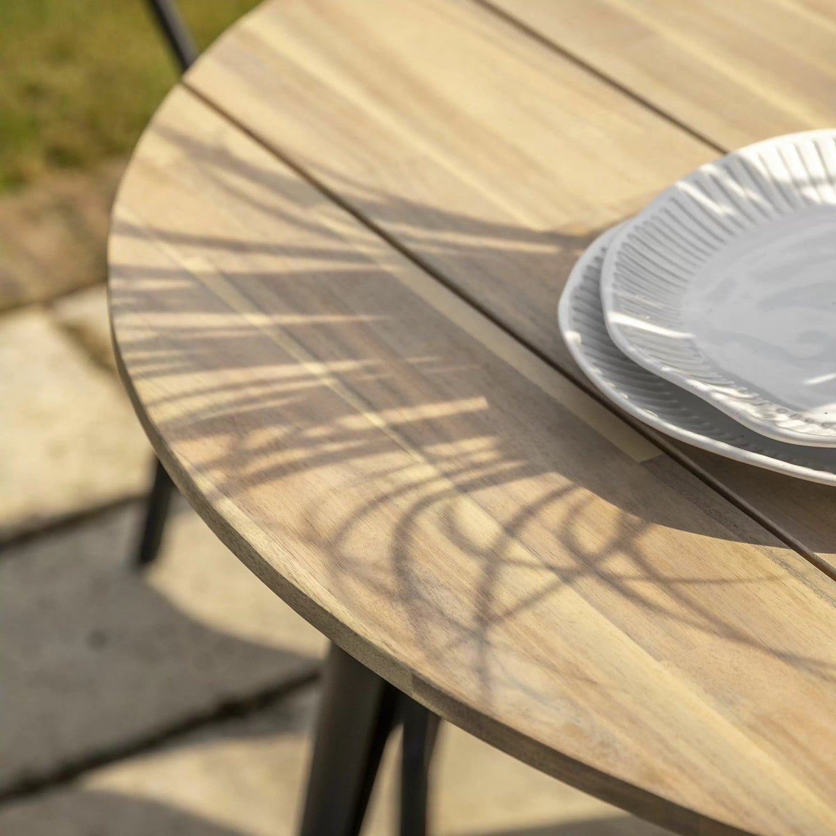 Ponza Round Dining Table.