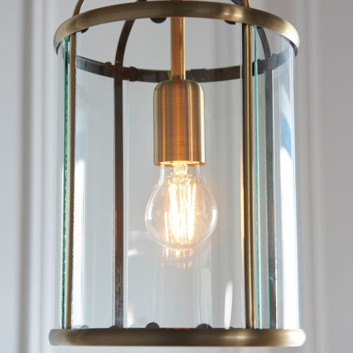 Cowslip Pendant Light Antique Brass.