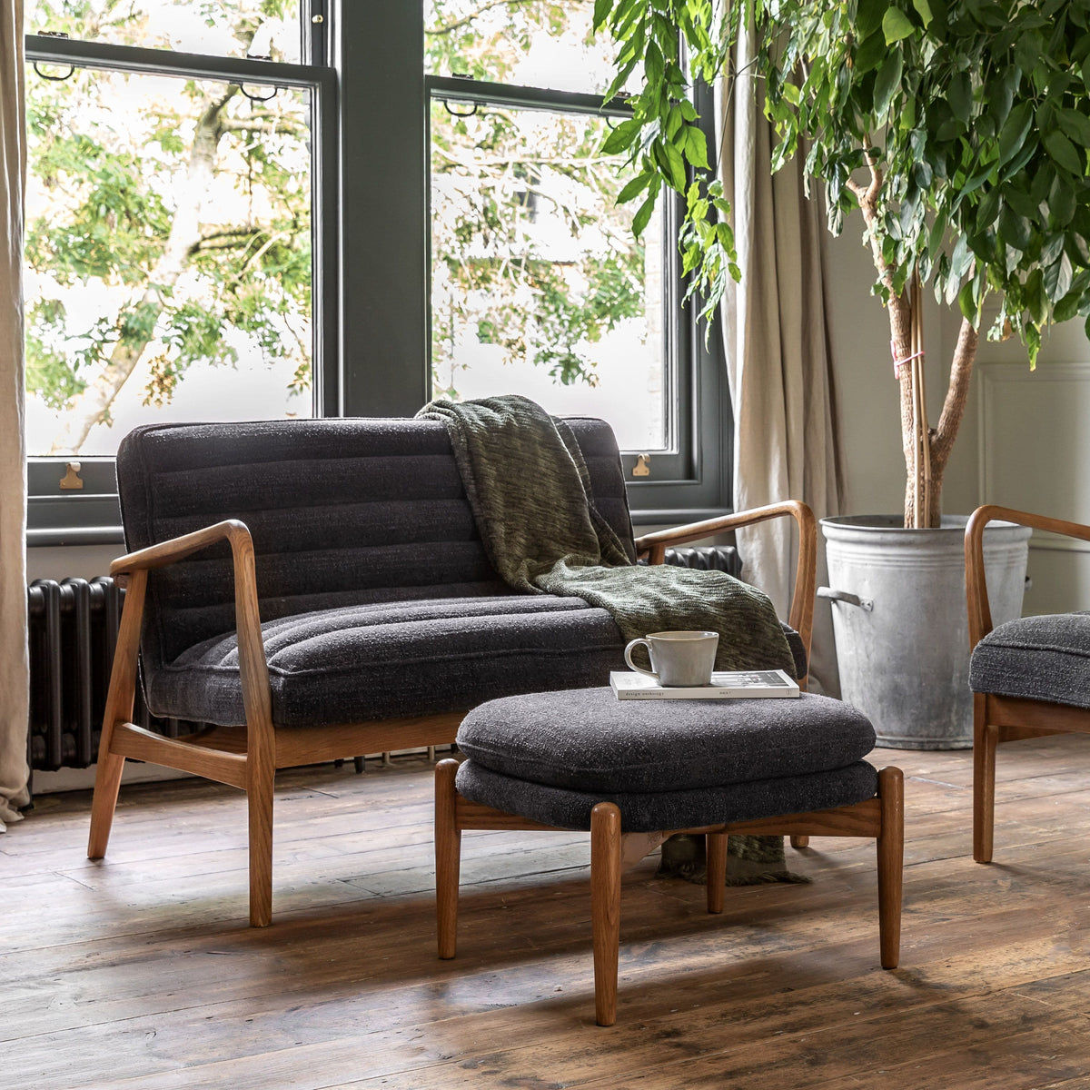 Datzun Footstool Charcoal Boucle.