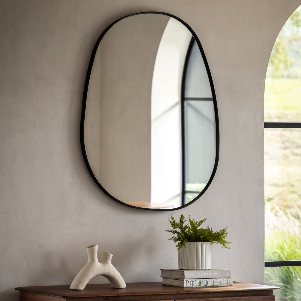 Bodhi Mirrors Holdon Pebble Mirror Black Large House of Isabella UK