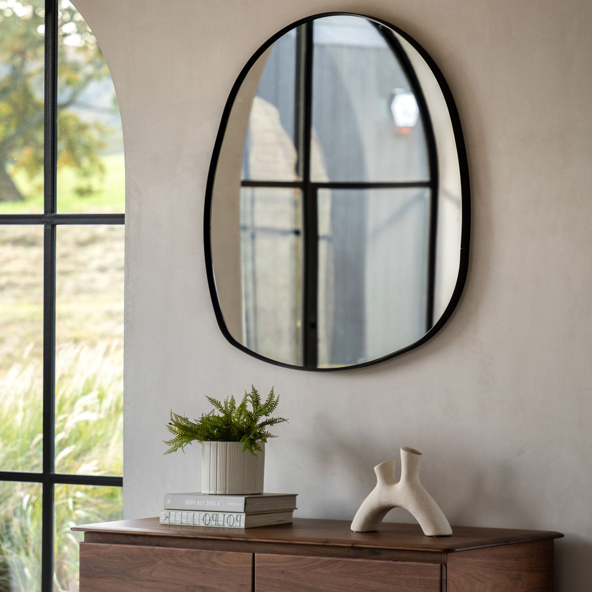 Bodhi Mirrors Holdon Pebble Mirror Black Small House of Isabella UK