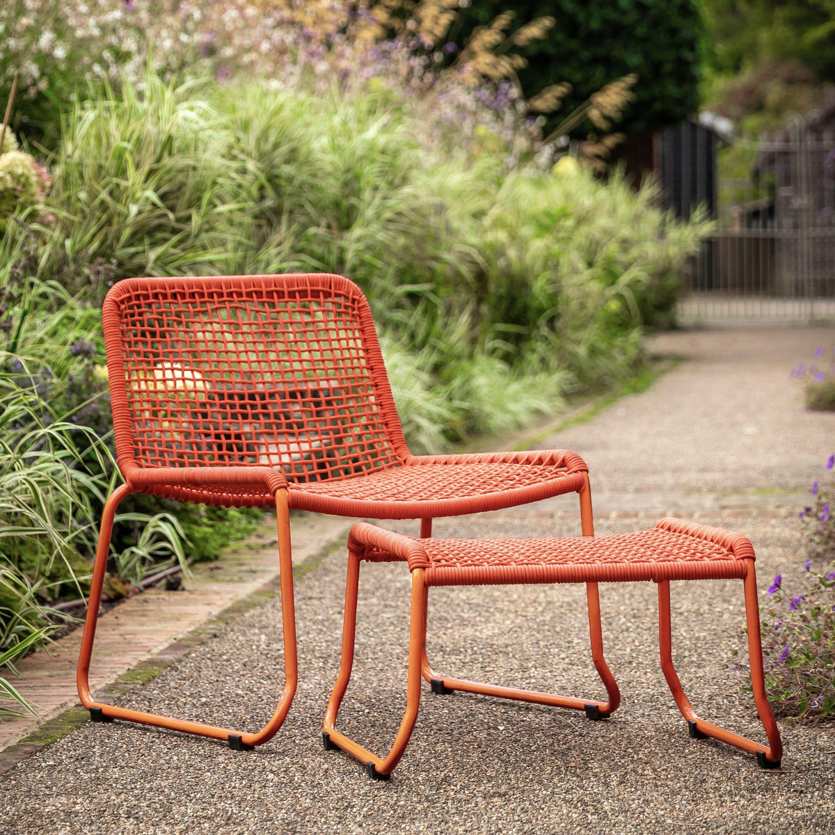 Sassano Lounge Chair with Footstool Orange.