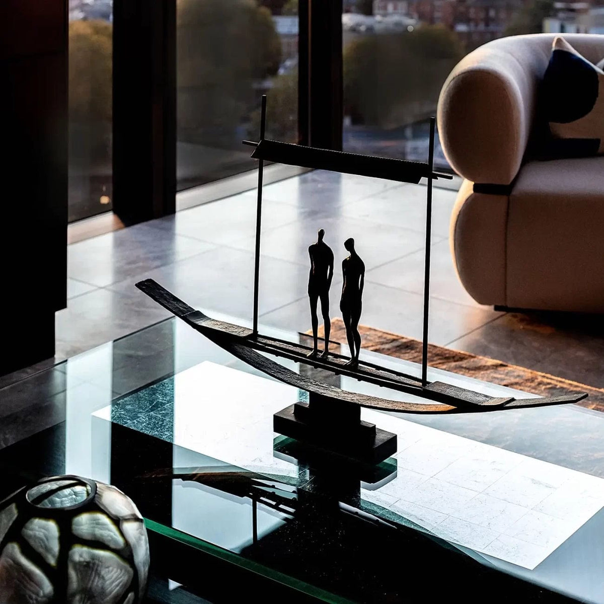 Bronze Figures in Sampan.