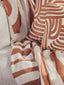 Hamilton Interiors Sleeping Bosie Ozella Natural And Terracotta Throw House of Isabella UK
