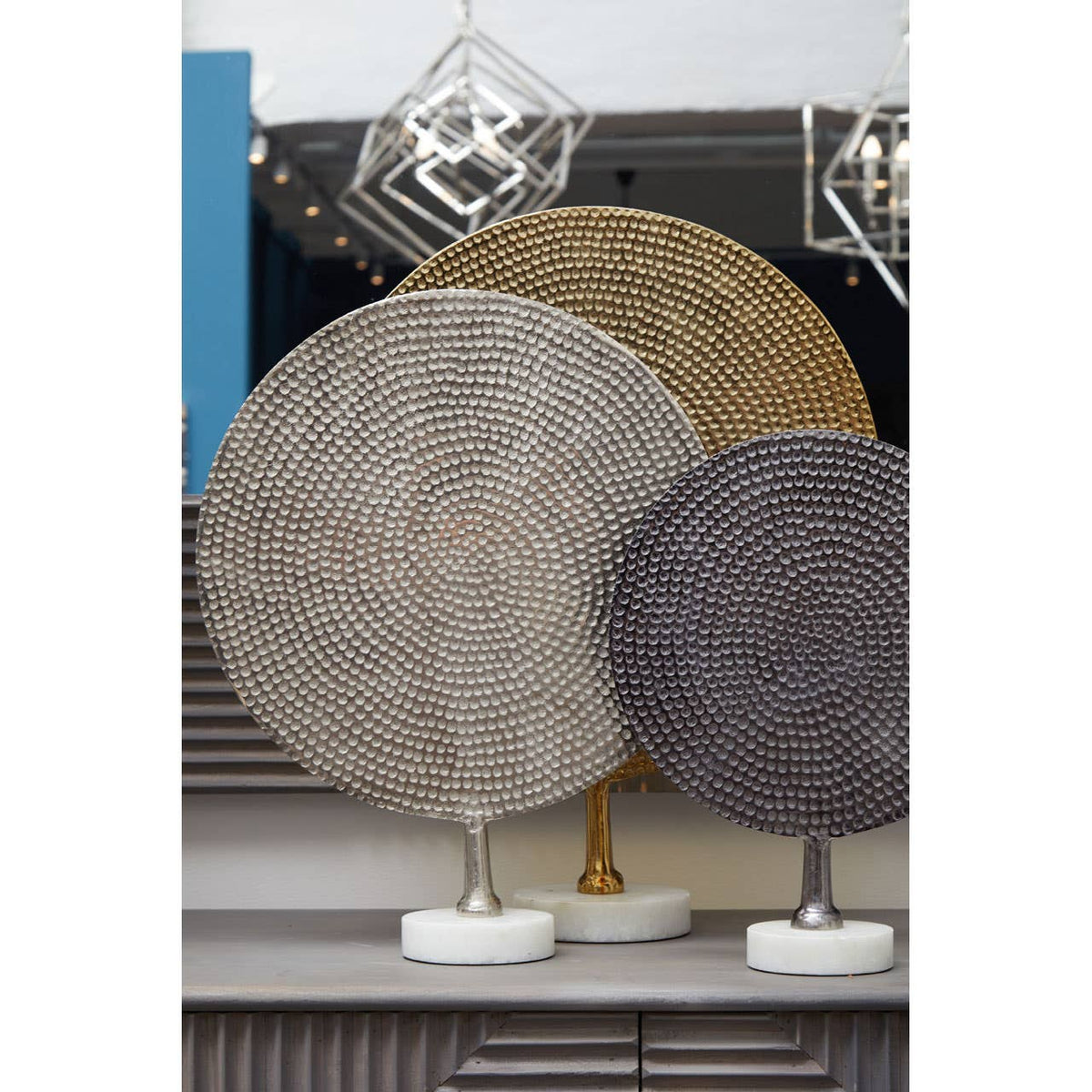 Elias Set Of Three Gold Silver And Black Hammered Metal Sculptures.