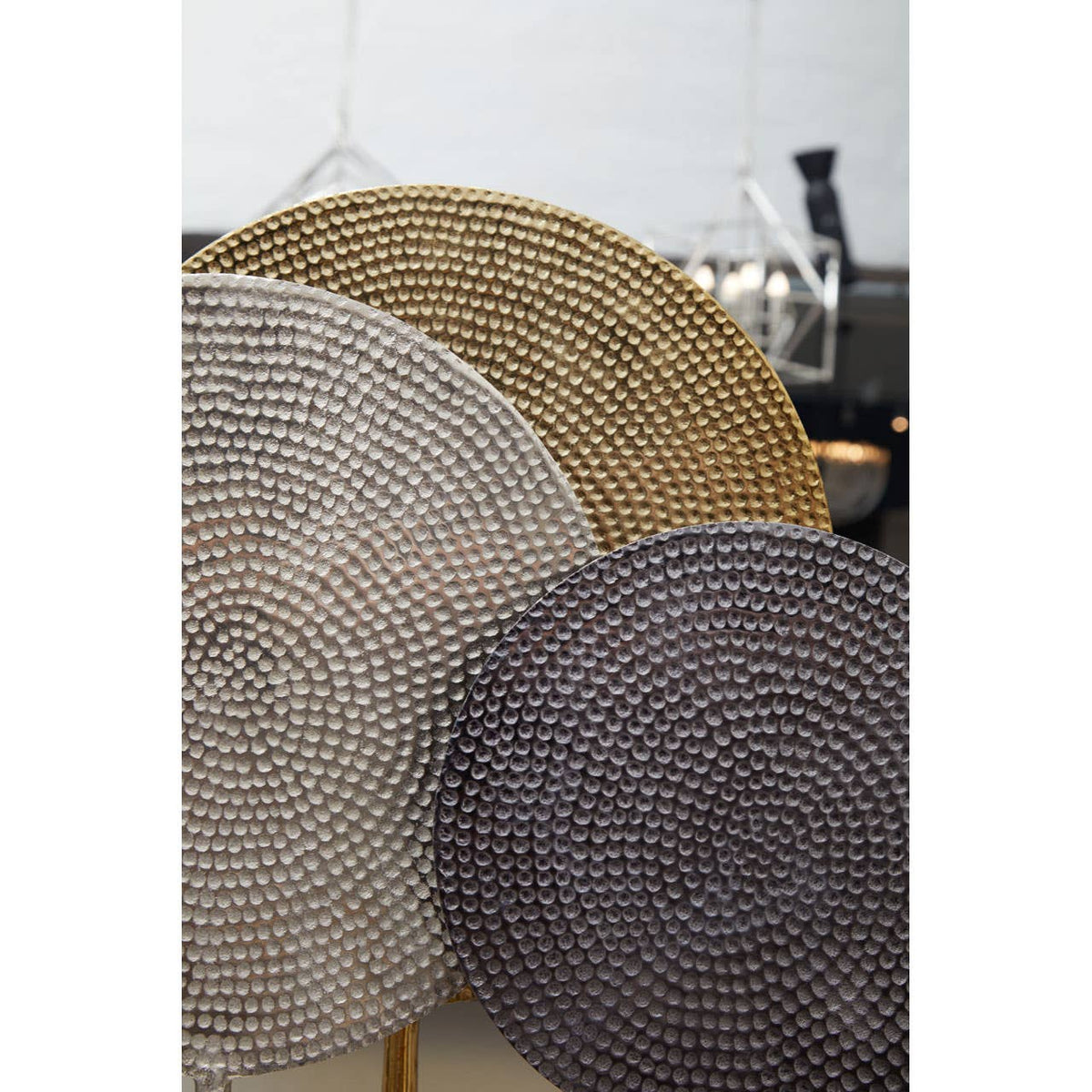 Elias Set Of Three Gold Silver And Black Hammered Metal Sculptures.