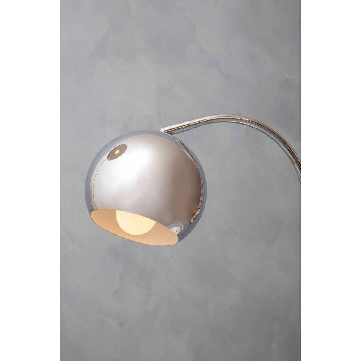 Karter Chrome Finish Table Lamp With White Base.