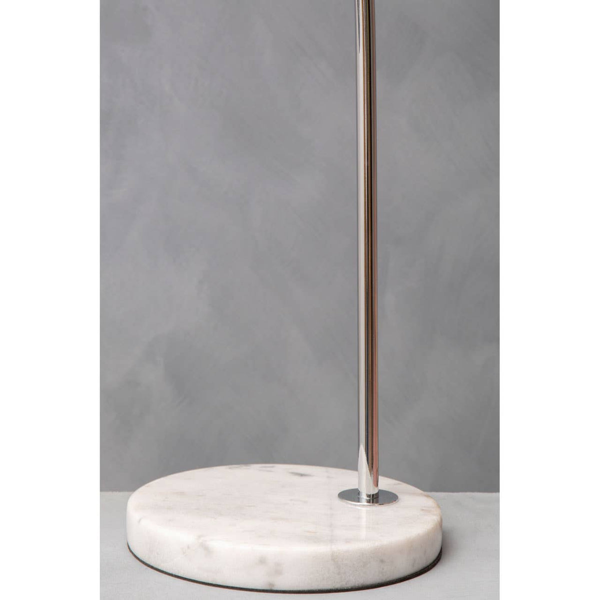 Karter Chrome Finish Table Lamp With White Base.