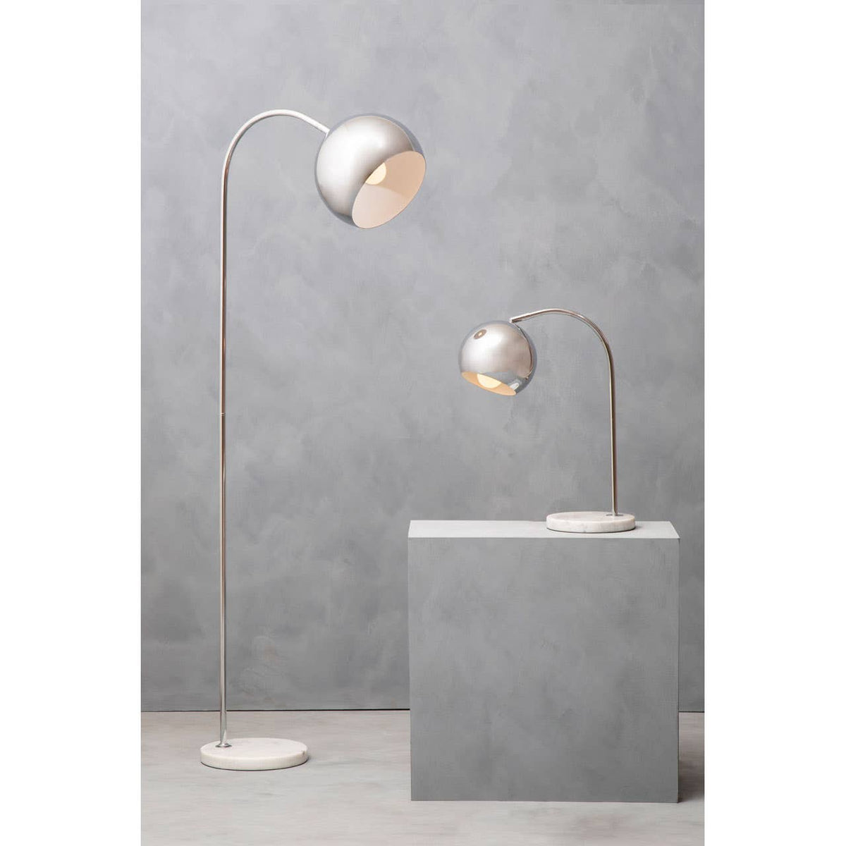 Karter Floor Chrome Finish Lamp With White Base.