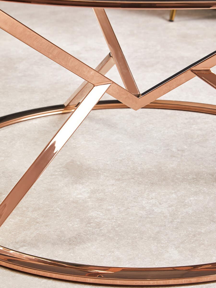 Alustre Corseted Round Rose Gold Coffee Table.