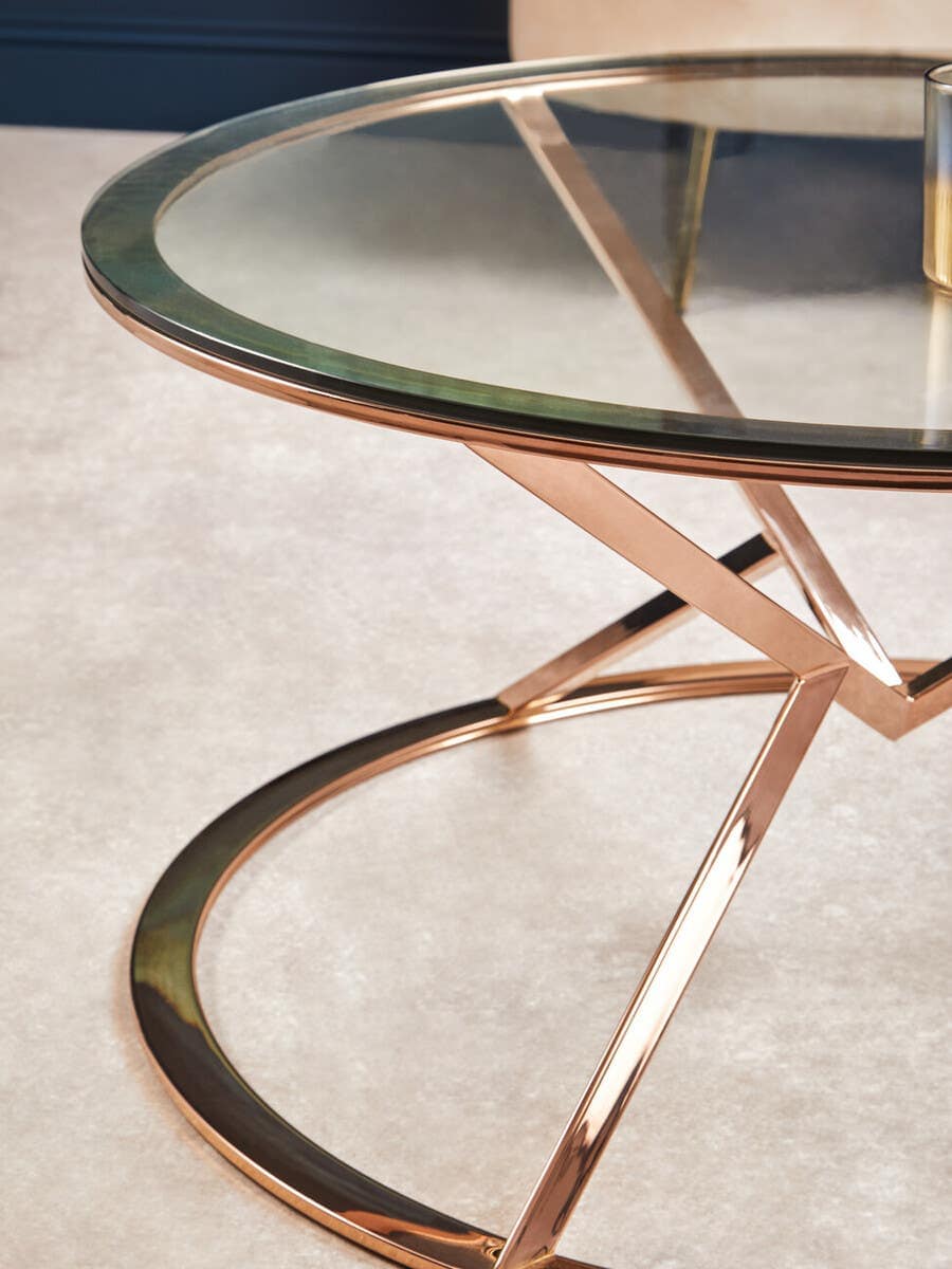 Alustre Corseted Round Rose Gold Coffee Table.