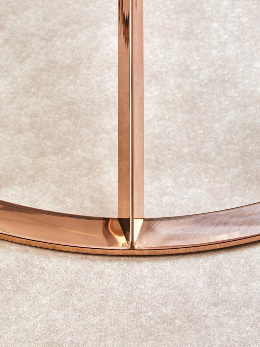 Alustre Corseted Round Rose Gold Coffee Table.