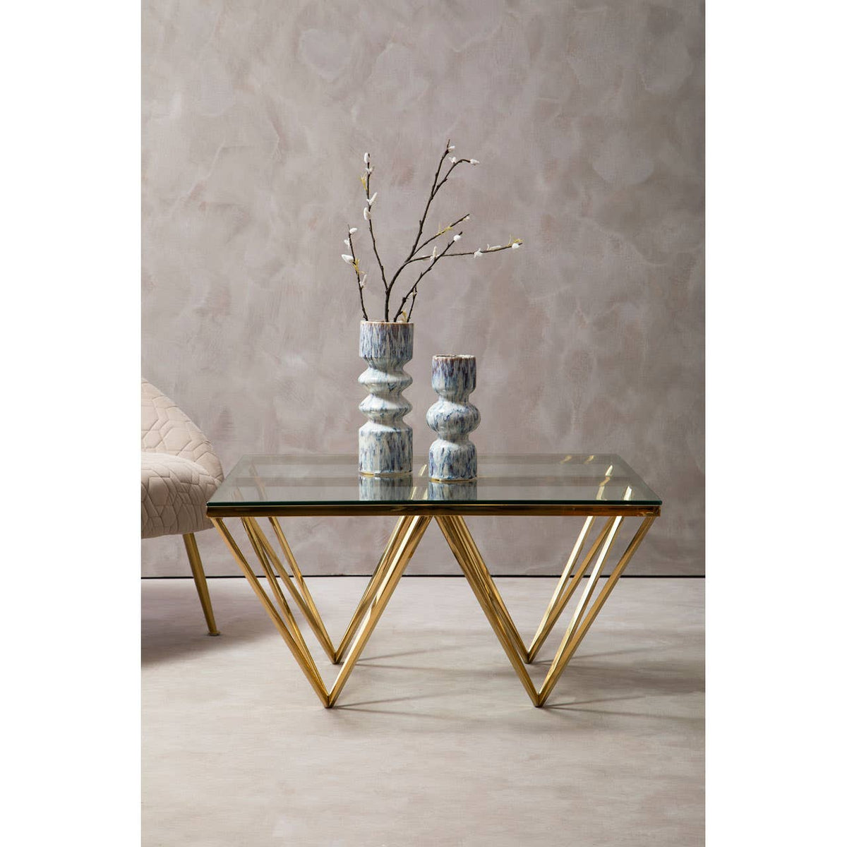 Alustre Gold Finish Prismaric Square Coffee Table.