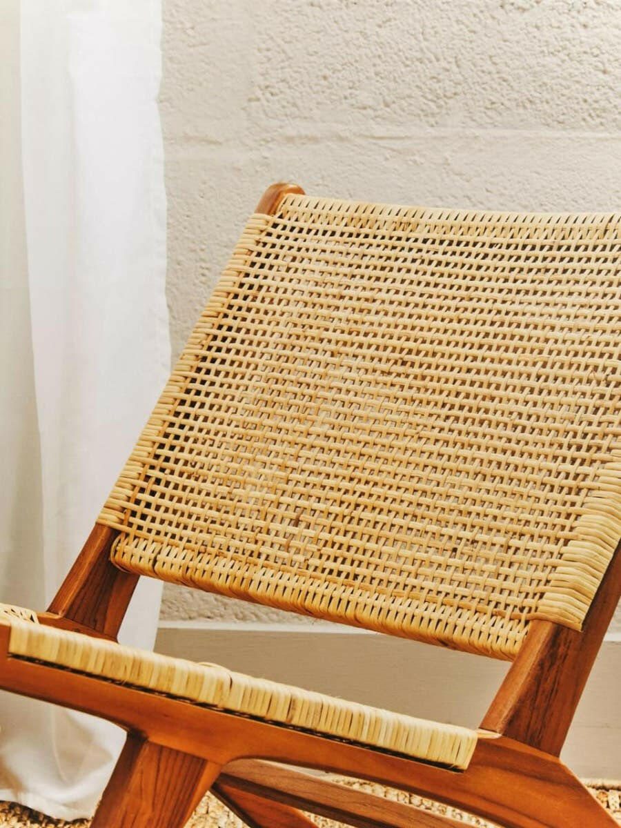 Lovina Teak Wood And Natural Rattan Lounge Chair.