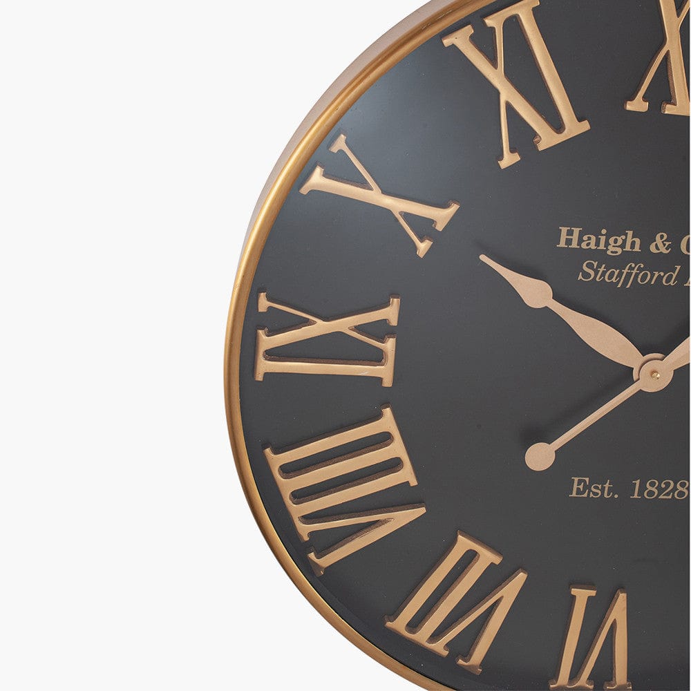 Antique Gold and Black Metal Wall Clock.