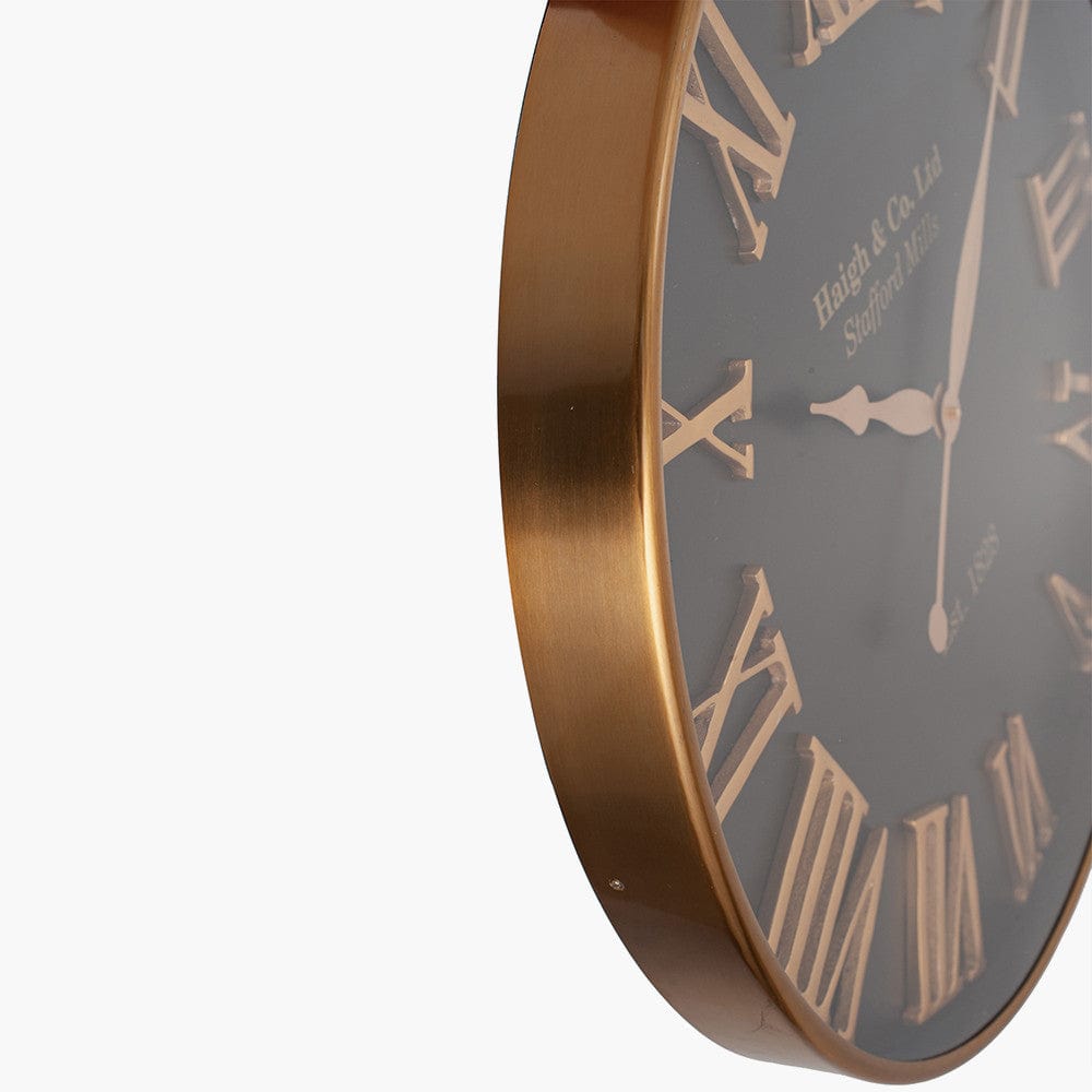 Antique Gold and Black Metal Wall Clock.