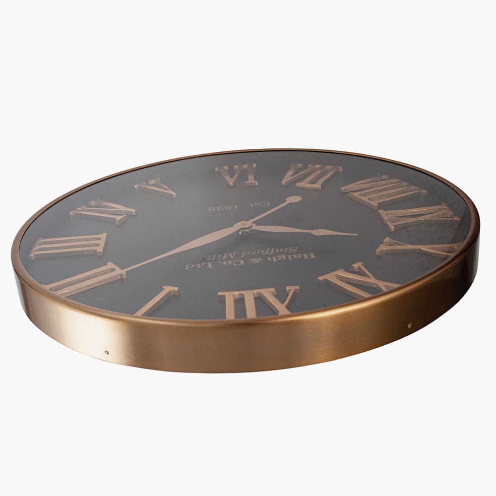 Antique Gold and Black Metal Wall Clock.