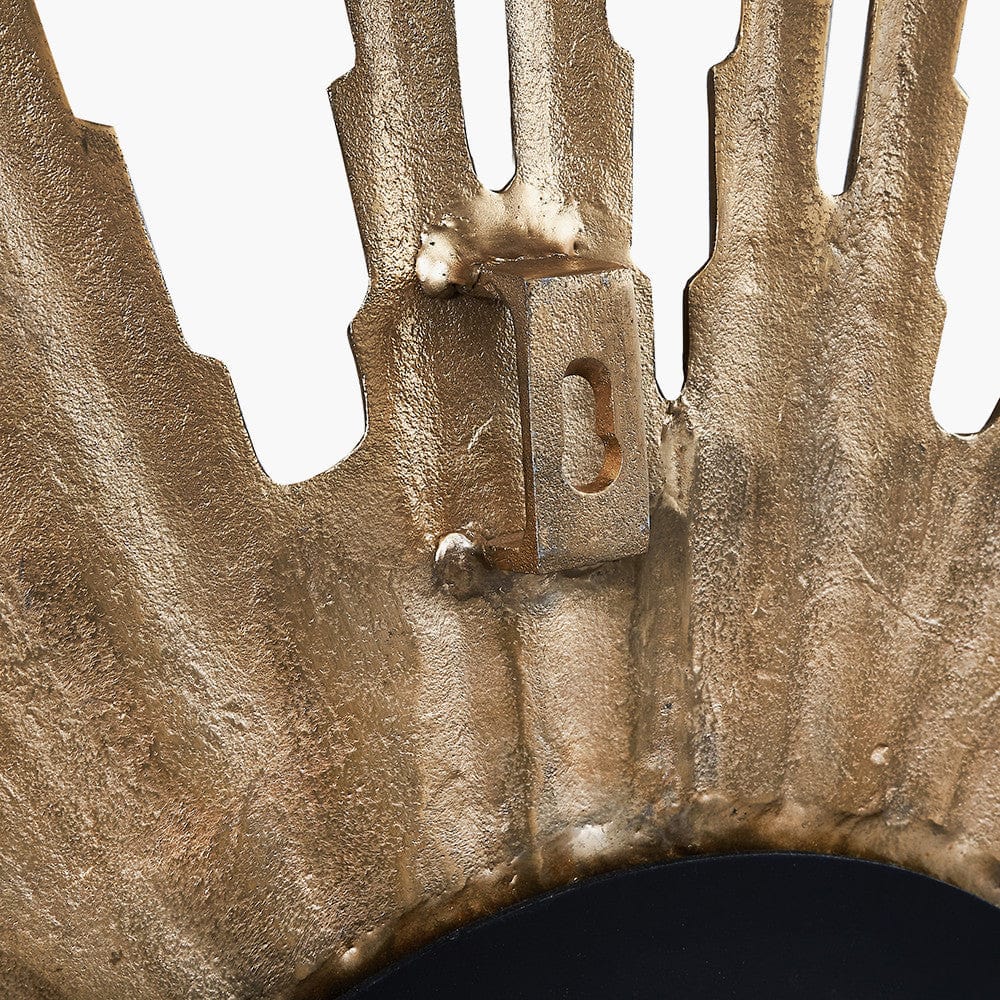 Gold Metal and Black Face Starburst Wall Clock.