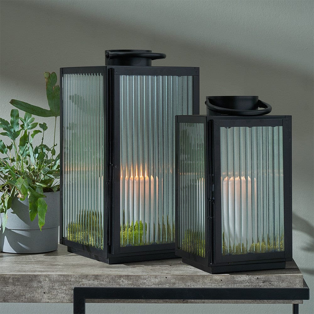 S/2 Black Metal and Ribbed Glass Lanterns.