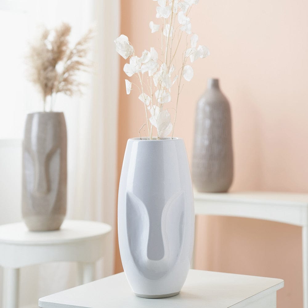 Visage White Stoneware Face Design Vase.