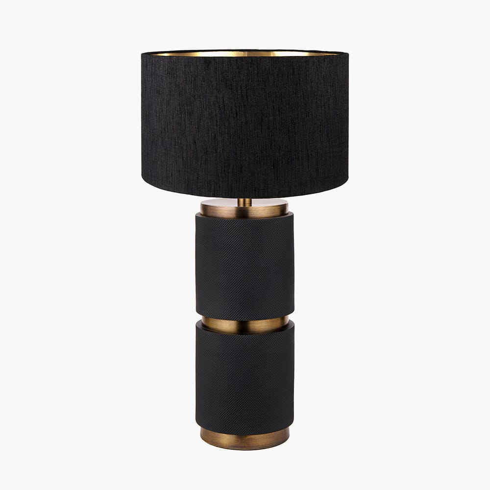 Pacific Lifestyle Lighting Alnico Black and Brass Metal Textured Table Lamp Base with Stellan 35cm Black Slubbed Silk Mix Gold Lined Cylinder Lampshade House of Isabella UK