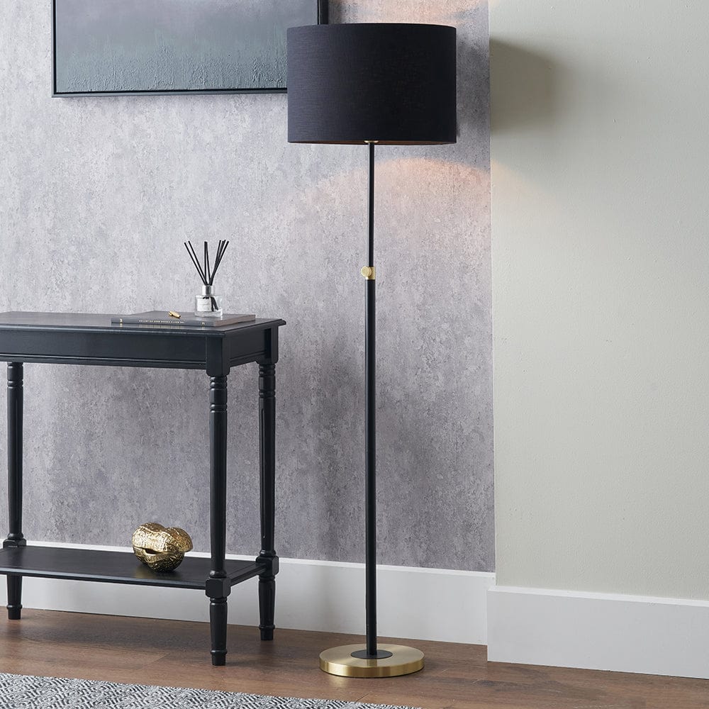 Bryce Black and Gold Metal Rise and Fall Floor Lamp.