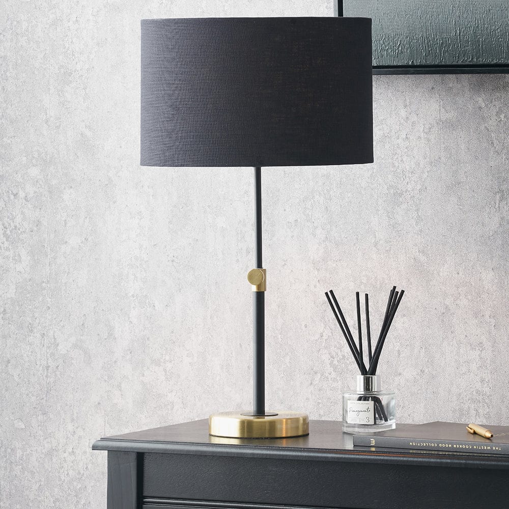Bryce Black and Gold Metal Rise and Fall Table Lamp.