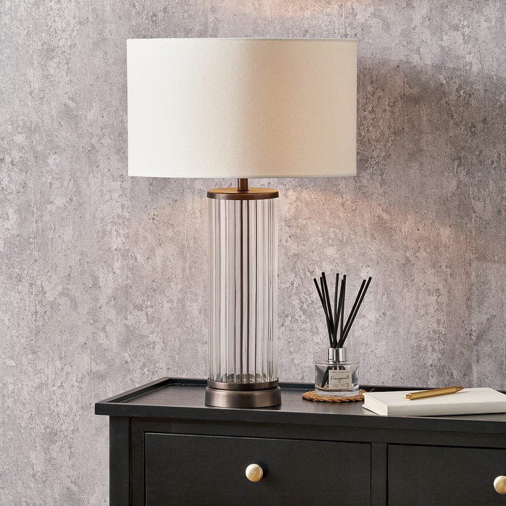 Ciara Clear Glass and Antique Bronze Metal Table Lamp Base with Henry 35cm White Handloom Cylinder Lampshade.