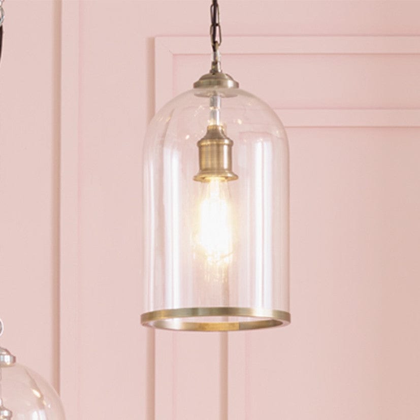 Cloche Clear Glass and Antique Brass Rimmed Pendant.