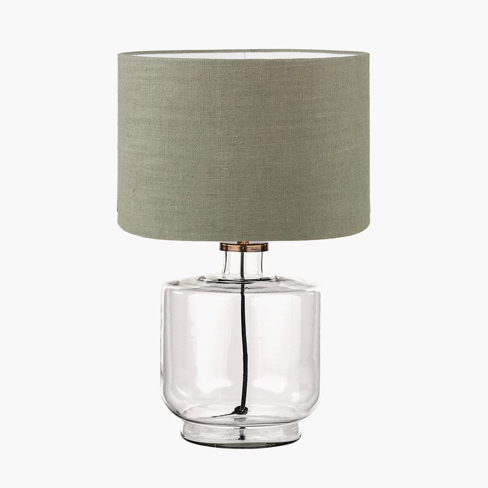Josie Clear Glass and Antique Brass Metal Table Lamp Base with Edward 30cm Pistachio Green Linen Cylinder Lampshade.