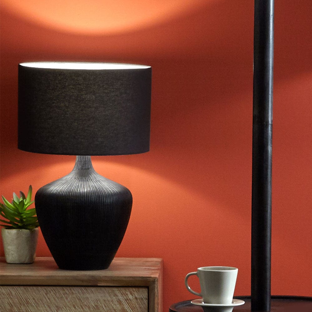 Manaia Antique Black Textured Wood Table Lamp - Base Only.