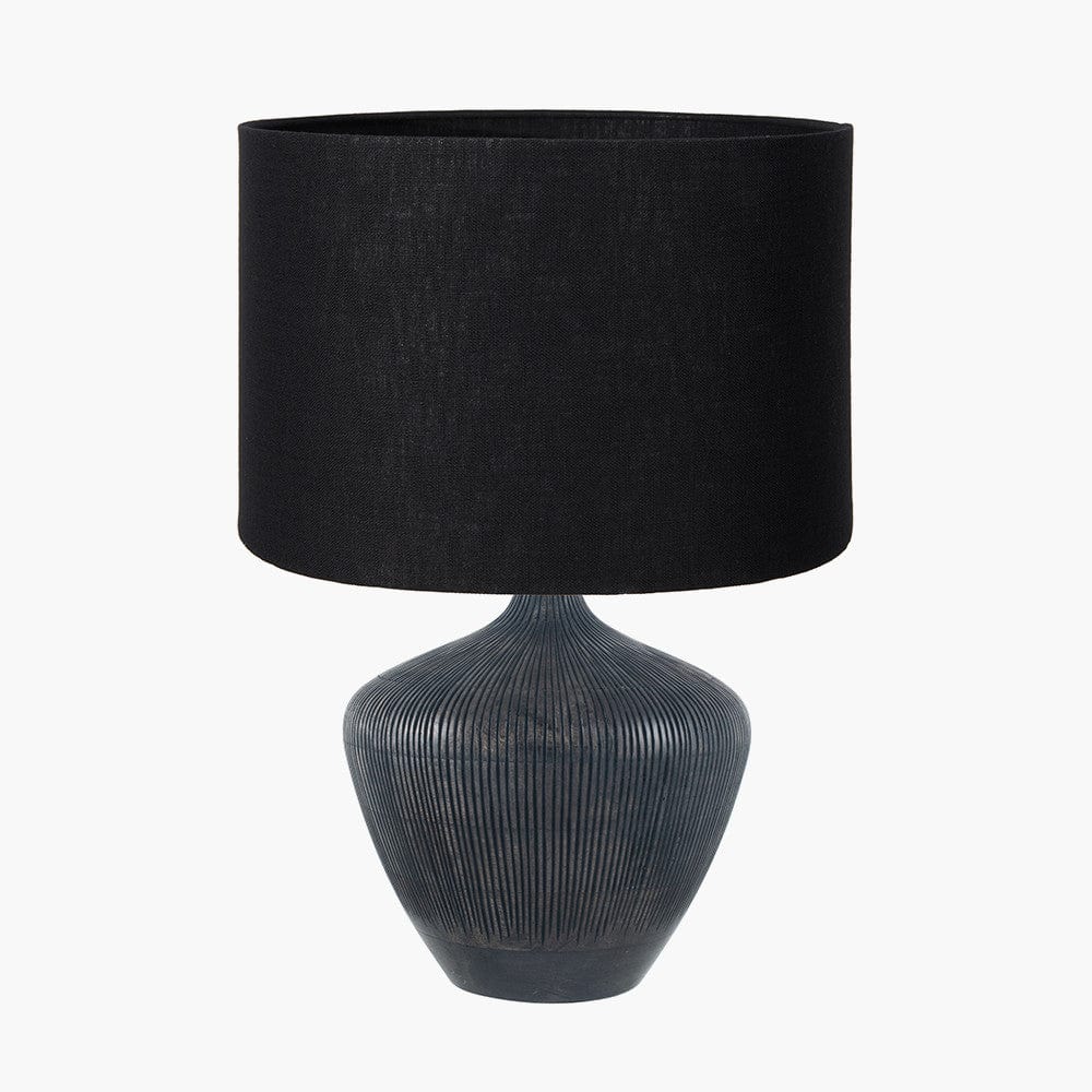 Manaia Antique Black Textured Wood Table Lamp Base with Lino 35cm Black Self Lined Linen Cylinder Lampshade.