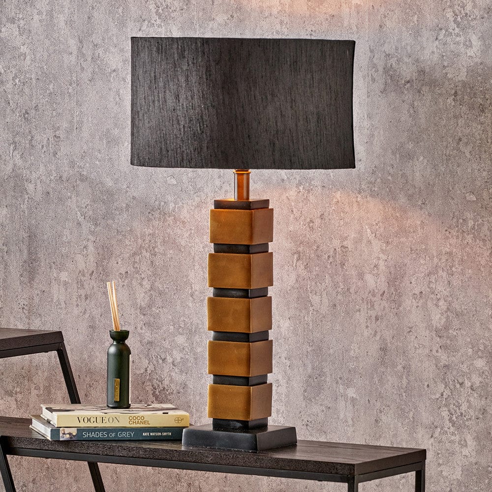 Maximo Antique Brass and Matt Black Cube Design Table Lamp Base with Stellan 35cm Black Slubbed Silk Mix Gold Lined Cylinder Lampshade.