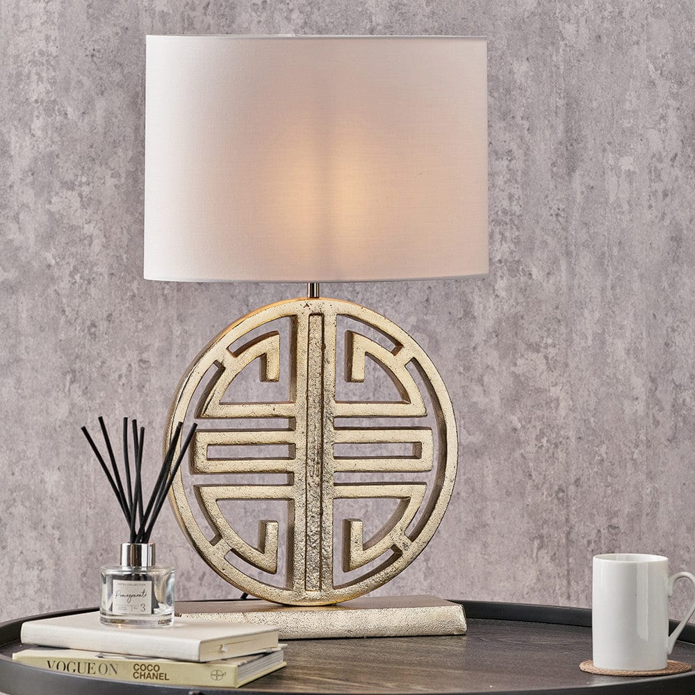 Orla Shiny Gold Metal Statement Circle Table Lamp Base with Mia 35cm Ivory Oval Cotton Mix Lampshade.