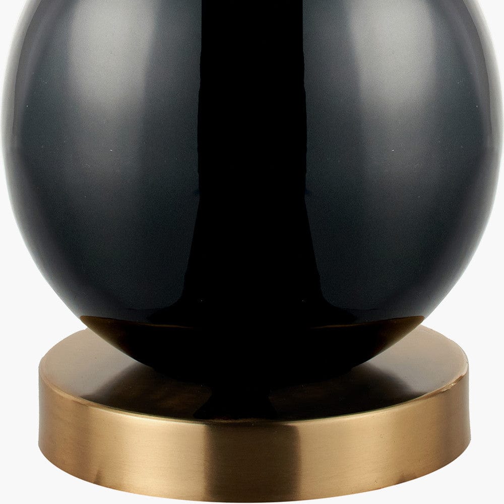 Sofia Black and Gold Enamel Table Lamp Base with Stellan 35cm Black Slubbed Silk Mix Gold Lined Cylinder Lampshade.