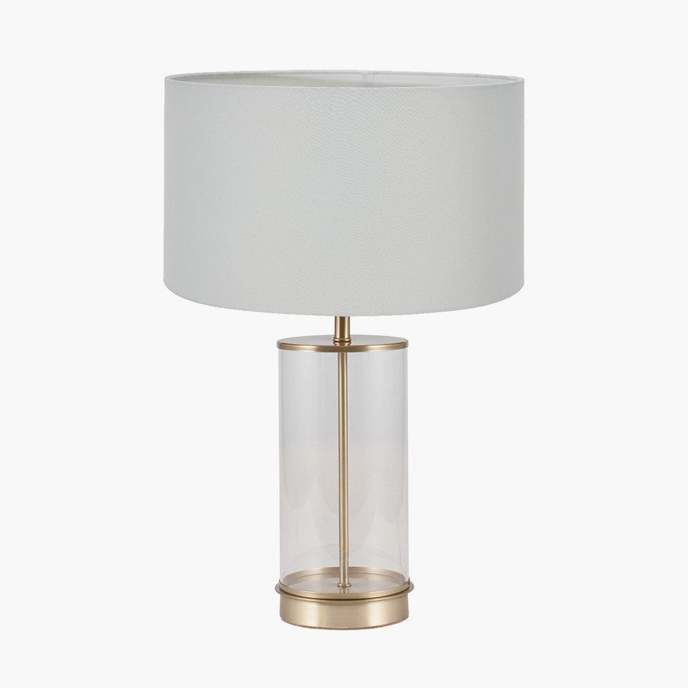 Westwood Clear Glass and Champagne Metal Table Lamp Base with Harry 35cm Ivory Cotton Mix Cylinder Lampshade.