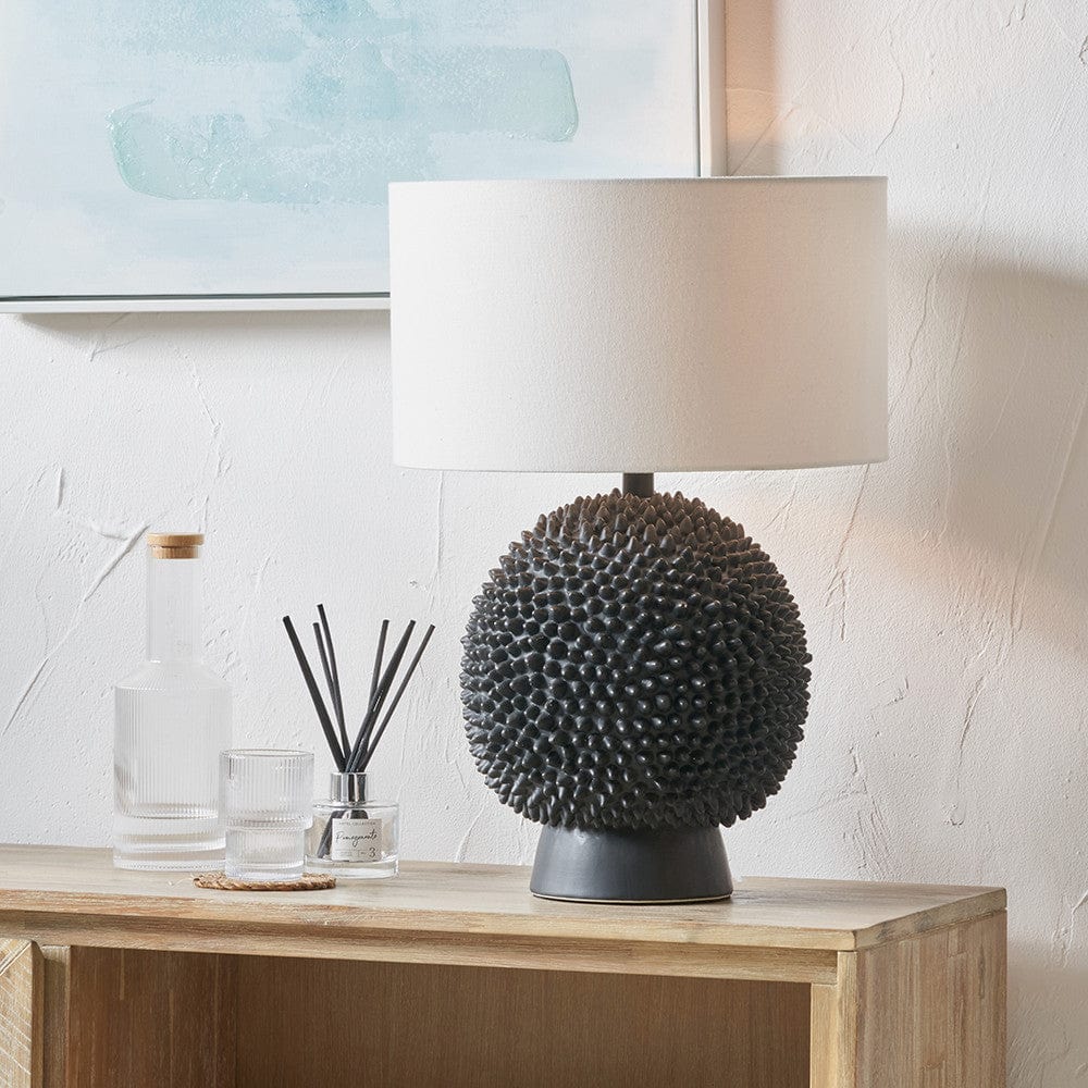 Wrenley Black Ceramic Sea Urchin Table Lamp Base with Henry 35cm White Handloom Cylinder Lampshade.