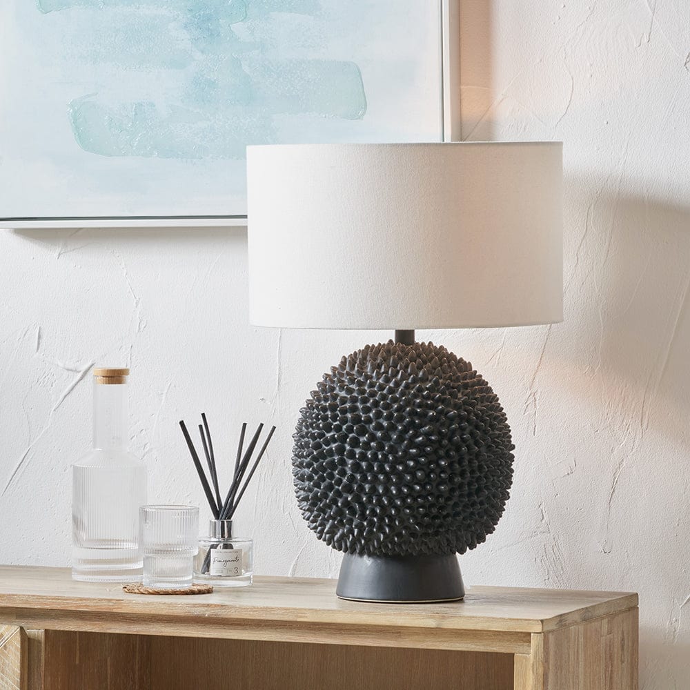 Wrenley Black Ceramic Sea Urchin Table Lamp Base with Henry 35cm White Handloom Cylinder Shade.